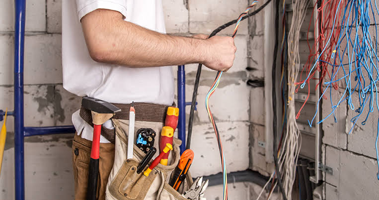 The electrician work in company